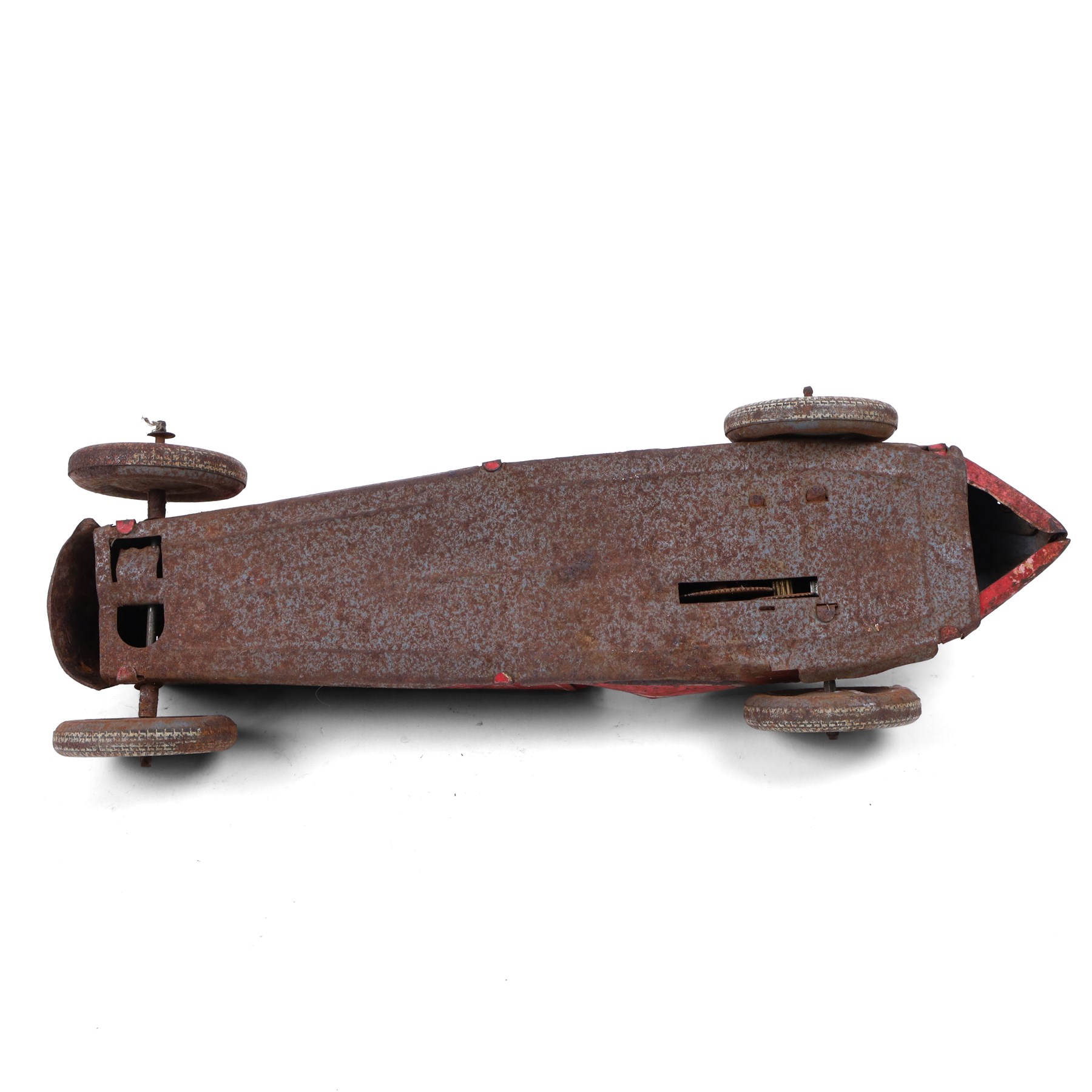 Mettoy tinplate clockwork racing car, the boat tailed red body with lithographed details, racing no. 7, with Dunlop Fort tyres, for restoration, H8cm, L32cm
