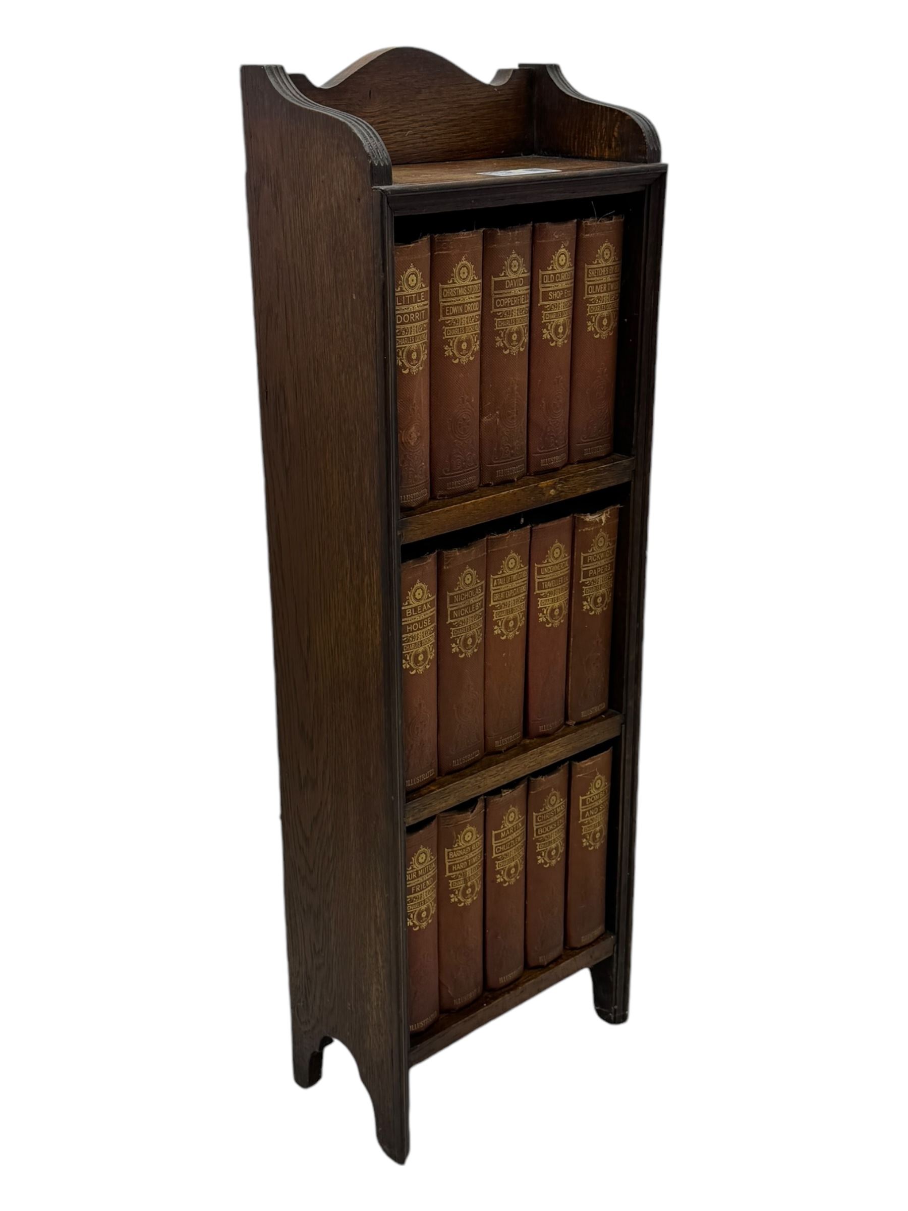 20th century oak barley twist gateleg table (W78cm); early 20th century narrow oak bookcase with Charles Dickens novels (W31cm, H93cm) 