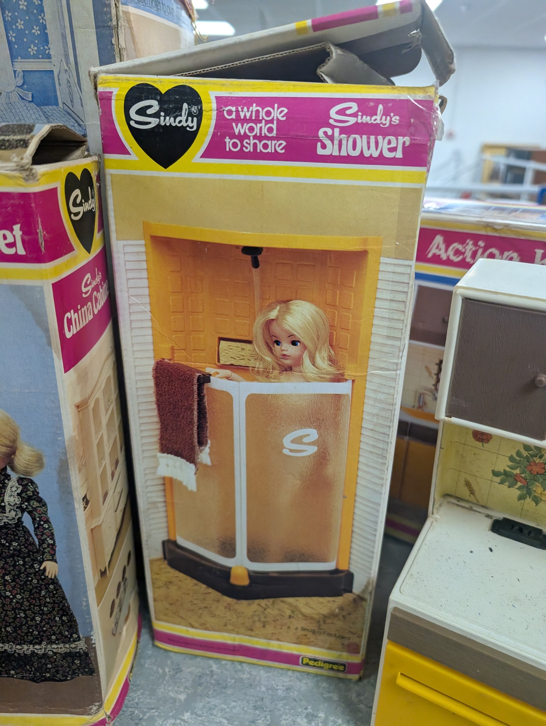 Pedigree Sindy's House and furniture, including shower, kitchen unit, washbasin, china cabinet and bed, all boxed, together with Barbie doll and horse