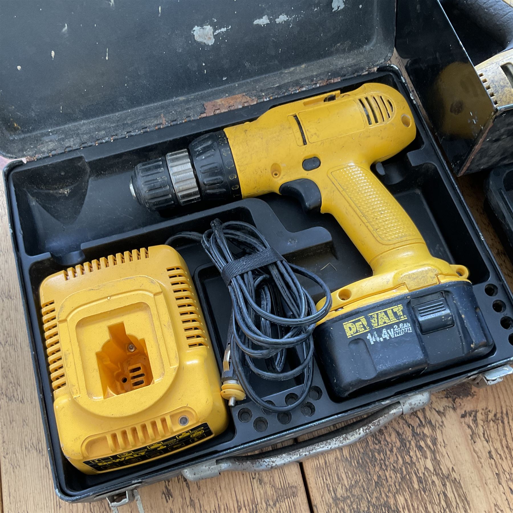Three DeWalt battery drills with batteries and charger  and black and decker corded drill - THIS LOT IS TO BE COLLECTED BY APPOINTMENT FROM DUGGLEBY STORAGE, GREAT HILL, EASTFIELD, SCARBOROUGH, YO11 3TX