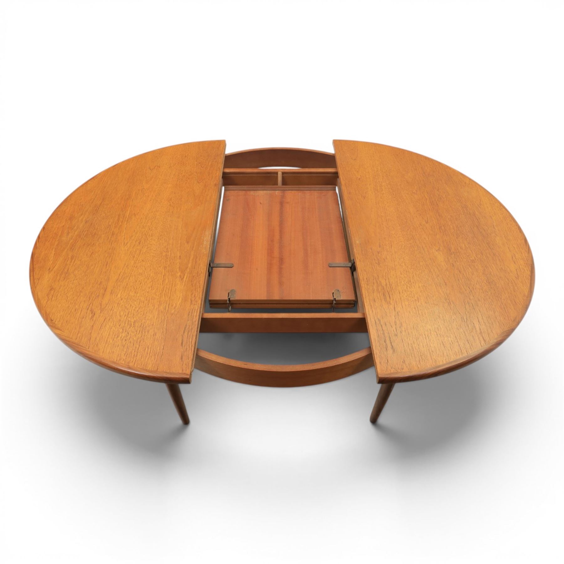 G-Plan - mid-20th century teak 'Fresco' circular extending dining table and six chairs, circular top with storable fold-over leaf extending to 166cm
