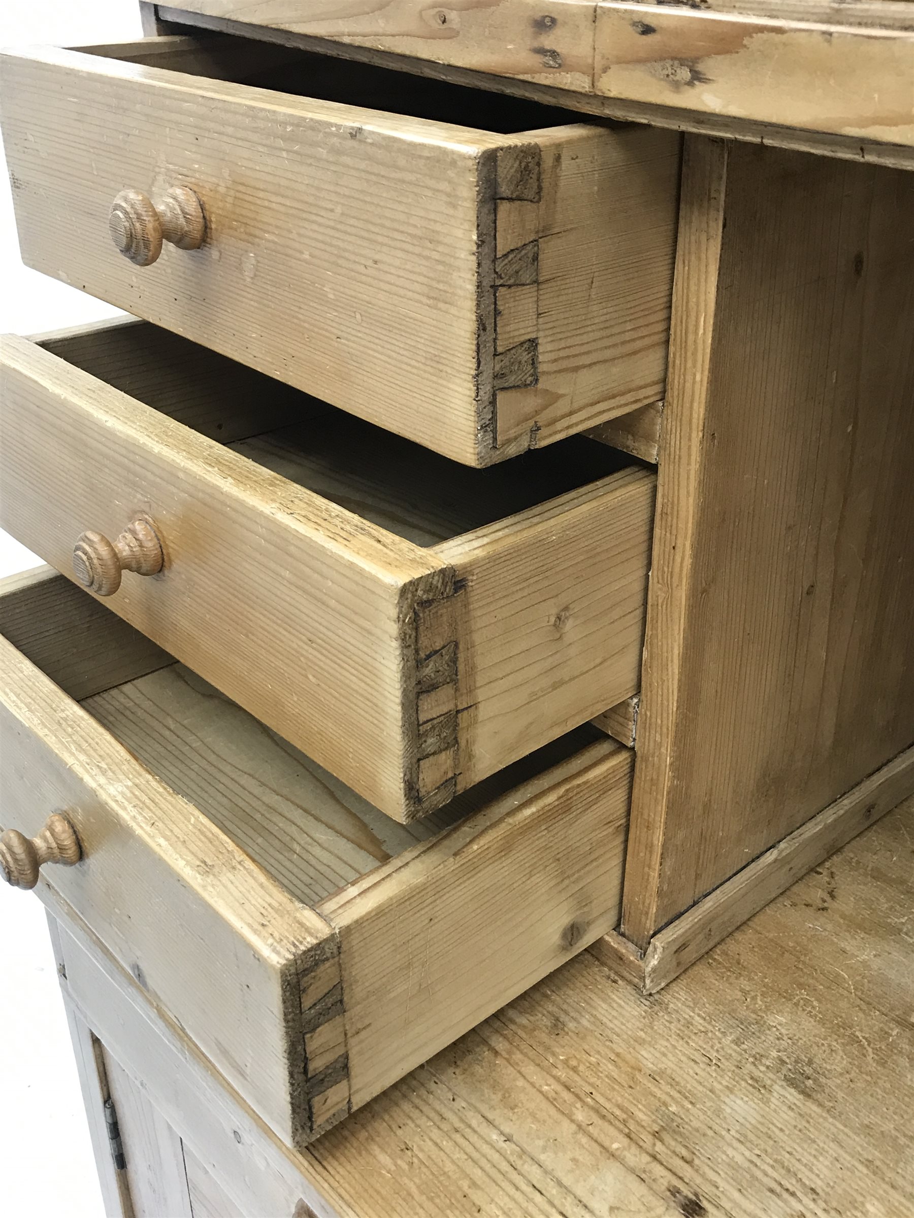 Early 20th century pine kitchen cupboard, raised glazed cabinets with drawers, lower section fitted with two drawers and panelled double cupboard, turned feet,  W127cm, H195cm, D62cm