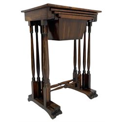 Regency rosewood nest of three tables, rectangular top on turned supports united by turned stretcher, on sledge platform with rounded feet, the smallest table with sliding storage or sewing well