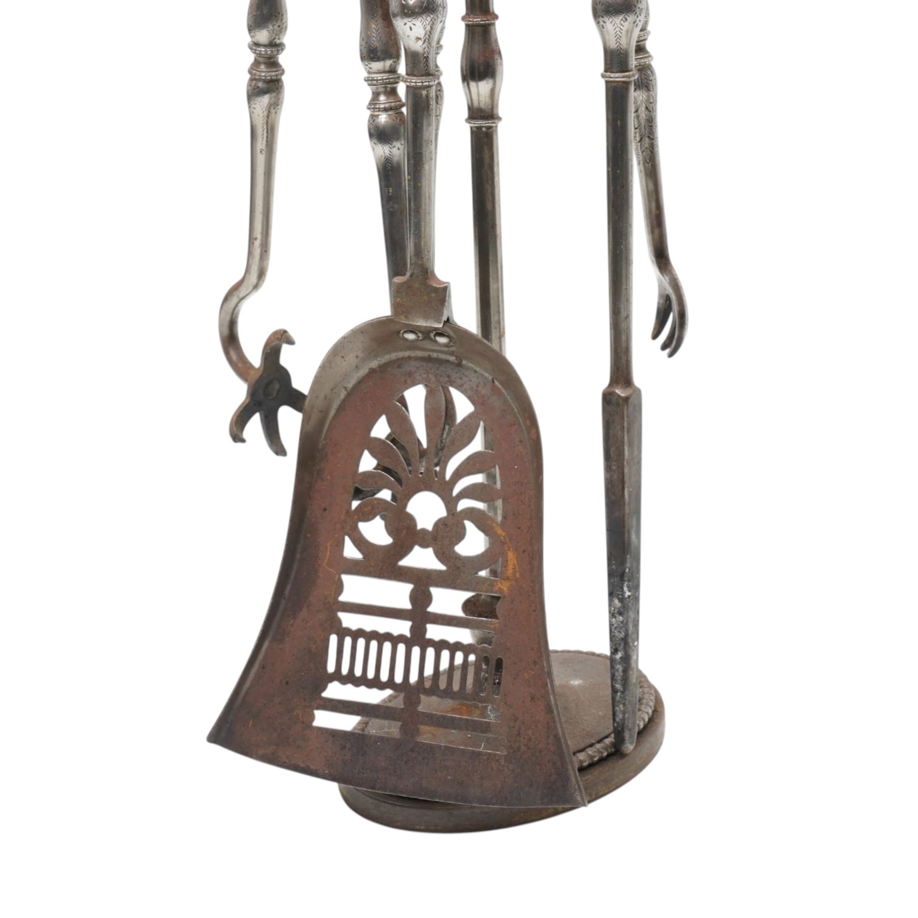 Two 19th century fireside companion sets, one four piece and one three piece, the stand and irons with etched foliate motifs, larger H74cm (2)
Provenance: Kirkham Hall