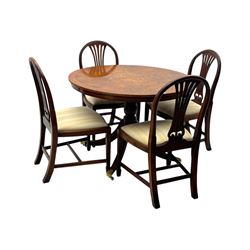 Ian Smith Furniture - Georgian design walnut centre table, the circular banded top with fluted edge, supported by a turned pedestal base with four splayed supports, each terminating in brass castors with claw caps; set of four mahogany dining chairs each with pierced vase-shaped splats and upholstered seats