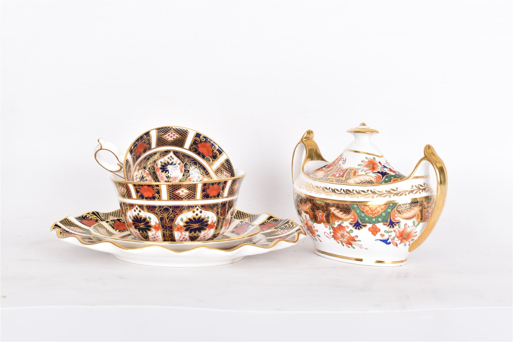 Royal Crown Derby 1128 Old Imari pattern, teacup and saucer, plate with fluted edge and open sucrier, together with spode twin handled sucrier