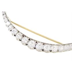19th century silver and gold diamond crescent moon brooch, set with twenty-one graduating old cut diamonds and six rose cut diamonds, total diamond weight approx 2.00 carat