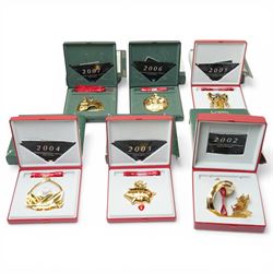 Set of six Georg Jensen annual mobile Christmas decorations, gold plated, comprising 2002 ...