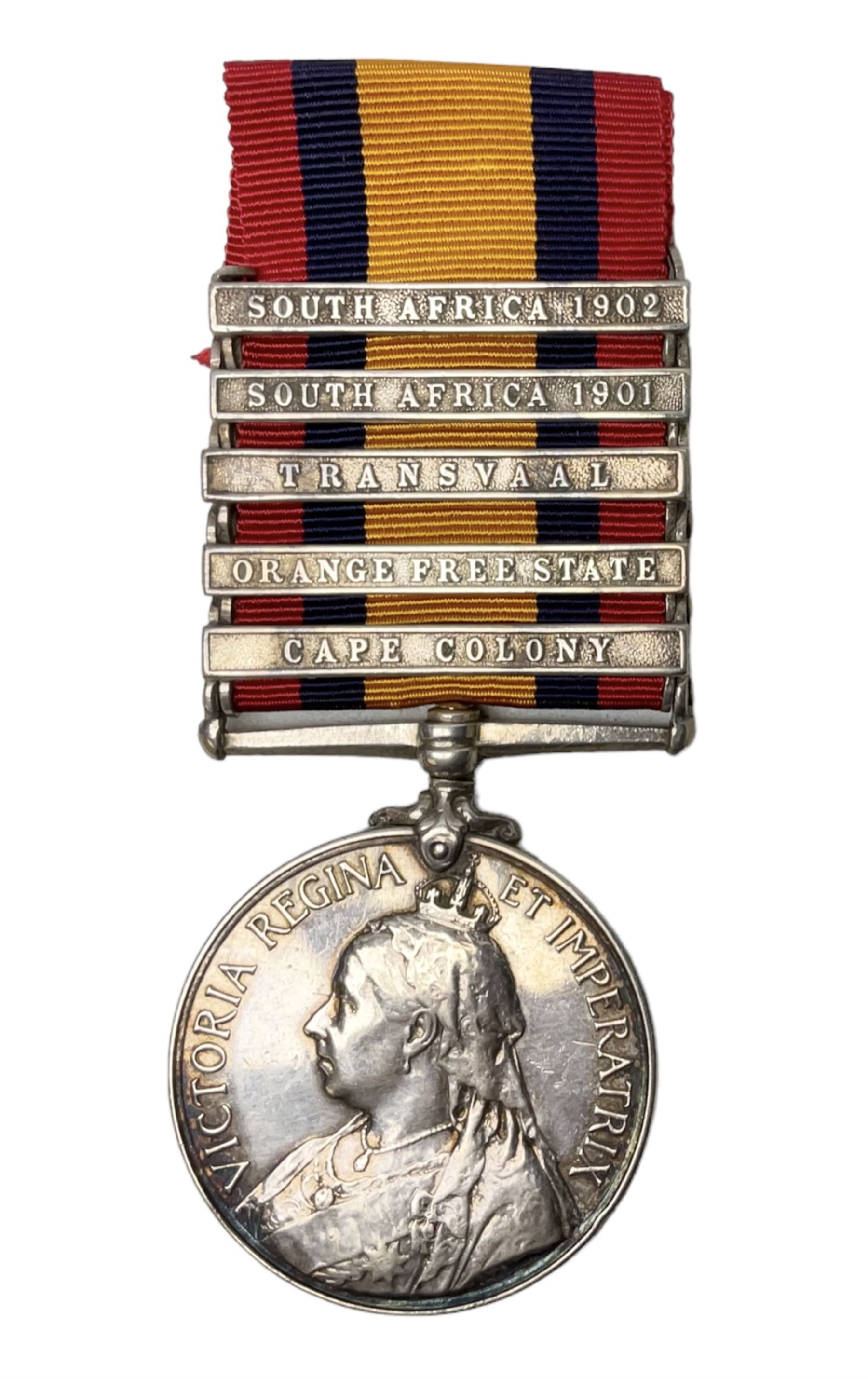 Queens South Africa Medal with five clasps for South Africa 1902/1901, Transvaal, Orange Free State and Cape Colony awarded to 4640 Pte. A. Farmer 1st Dgn. Gds. with ribbon and manuscript biographical details