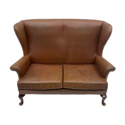 Parker Knoll - Mid 20th century two seat wing back sofa, upholstered in Rexine type fabri