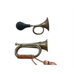 Collection of copper horns, including coaching horns, military bugle etc