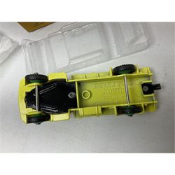 Ten Atlas Dinky die-cast models and accessories including, Bedford TK Tipper no. 435, Austin Wagon no. 412, two Miniatures, 25 O Camion Laiter, 'Panneaux De Signalisation Routiere' and others (10)