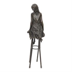 Art Deco style bronze modelled as a semi naked female figure, seated upon a chair, after 'Pierre Collinet', H27cm