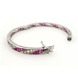  Ruby and diamond bracelet, rhodium plated gold rim setting comprising 48 diamonds and 60 rubies  