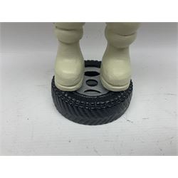 Cast iron figure of Michelin Man, stood on a tyre, H34cm 
