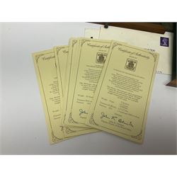 The Royal Mint 'Conservation Coin Collection' formed of twenty-four silver proof coins, housed in the wooden display case, with information booklet