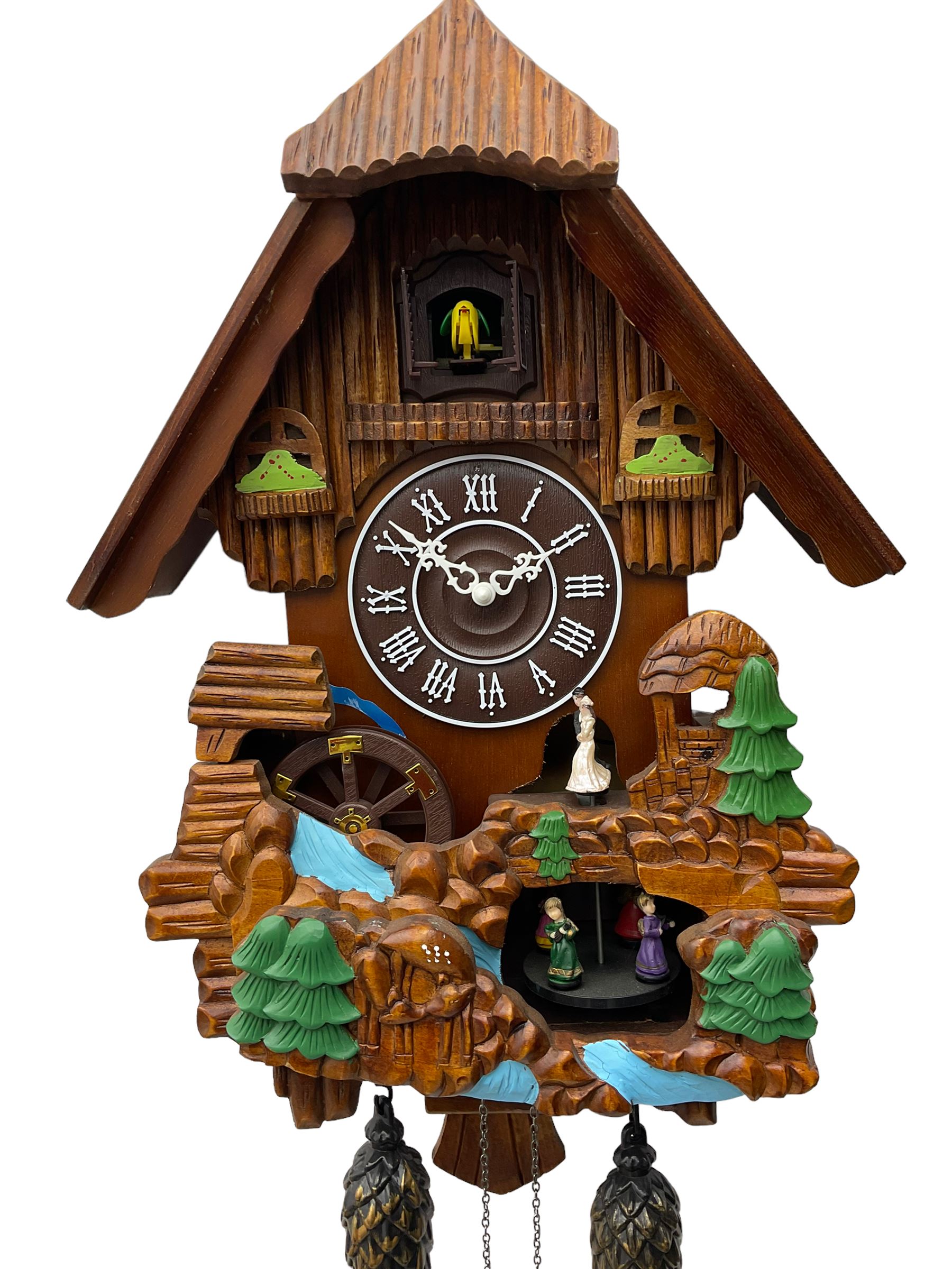 Battery operated cuckoo clock in a traditional chalet styled case with