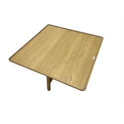 Contemporary square oak table, on turned supports joined by stretchers