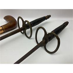 Leather covered swagger/sword stick with 40cm steel blade L62cm overall; another ash sword stick with 30cm diamond section steel blade; pair of fencing foils, the blades marked Solingen; two reproduction flintlock pistols; and 92cm inert cartridge belt (7)