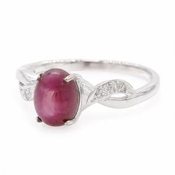 9ct white gold star ruby ring, single cabochon cut ruby, with crossover diamond chip shoulders, hallmarked