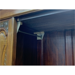 *Edwardian walnut narrow single wardrobe, projecting cornice over single bevelled mirror glazed door, panelled front carved with shells and flower heads, base fitted with single drawer, W90cm, H202cm, D54cm