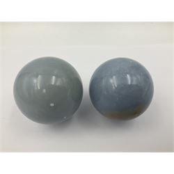 Pair of angelite spheres upon gilt metal stands, H8cm D6cm