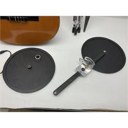 Spanish BM acoustic guitar with mahogany back and sides and spruce top L101cm; in cello carrying case; Roland foot pedal and two Yamaha foot pedals; tin D# organ pipe; folding music stand etc