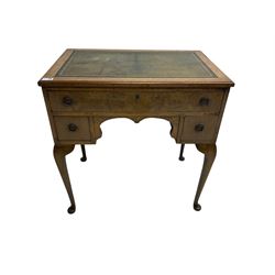 Georgian design walnut writing table, rectangular top with inset leather writing surface, fitted with three kneehole drawers, raised on cabriole supports