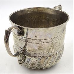 William & Mary silver porringer, the part fluted body with twin scroll handles, chased borders and initialled TF, SD and dated 98, also inscribed beneath with date of 1698, hallmarked Katherine Mangy, Hull, circa 1697, H8cm, approximate weight 4.46 ozt (138.8 grams)