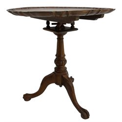 Georgian design hardwood tripod table, moulded pie-crust tilt-top, turned and fluted column carved with foliage, on three acanthus leaf carved splayed supports with ball and claw feet
