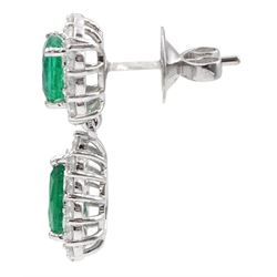 Pair of 18ct white gold pear and round cut emerald and round brilliant cut diamond pendant stud earrings, stamped, total emerald weight approx 3.45 carat, total diamond weight approx 1.70 carat