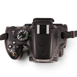 Nikon D5100 DSLR camera body, serial no. 6298157, with user manual, battery charger and Magic Lantern guide