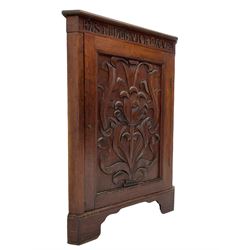 Late 19th century carved walnut corner cabinet