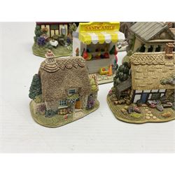 Eighteen Lilliput Lanes, including The Penny Farthing, The Pigsty, Borrowdale School, Fairy Cake Tearoom, An Apple a Day,Ladybird Cottage etc, all with original boxes 