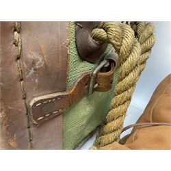 WW2 British Army RAMC 'Regimental Medical Pannier', well marked externally and dated 1941, stamped May 1943 internally, canvas covered wicker form with leather edges, hinged top and fall front with two rope carrying handles, fitted iron locking straps with securing chains; contains various unused field dressings and bandages with WW2 dates and two pillows; original label under lid L79cm