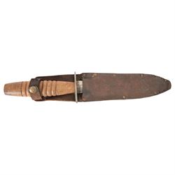 WWII British Fairbairn Sykes Wooden Hilt Commando Knife, with unmarked 17cm double edged blade, oval steel cross guard, barrel style wooden grip, in leather scabbard, overall L30cm