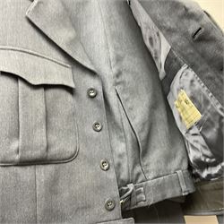Two post-WWII British Army No.2 Dress tunics, one with Green Howards buttons; army shirt dated 1951; Royal Fleet Auxilliary jacket with trousers; three RAF/WAAF uniforms and RAF Greatcoat; and three canvas/webbing bags, two dated 1943 & 1945