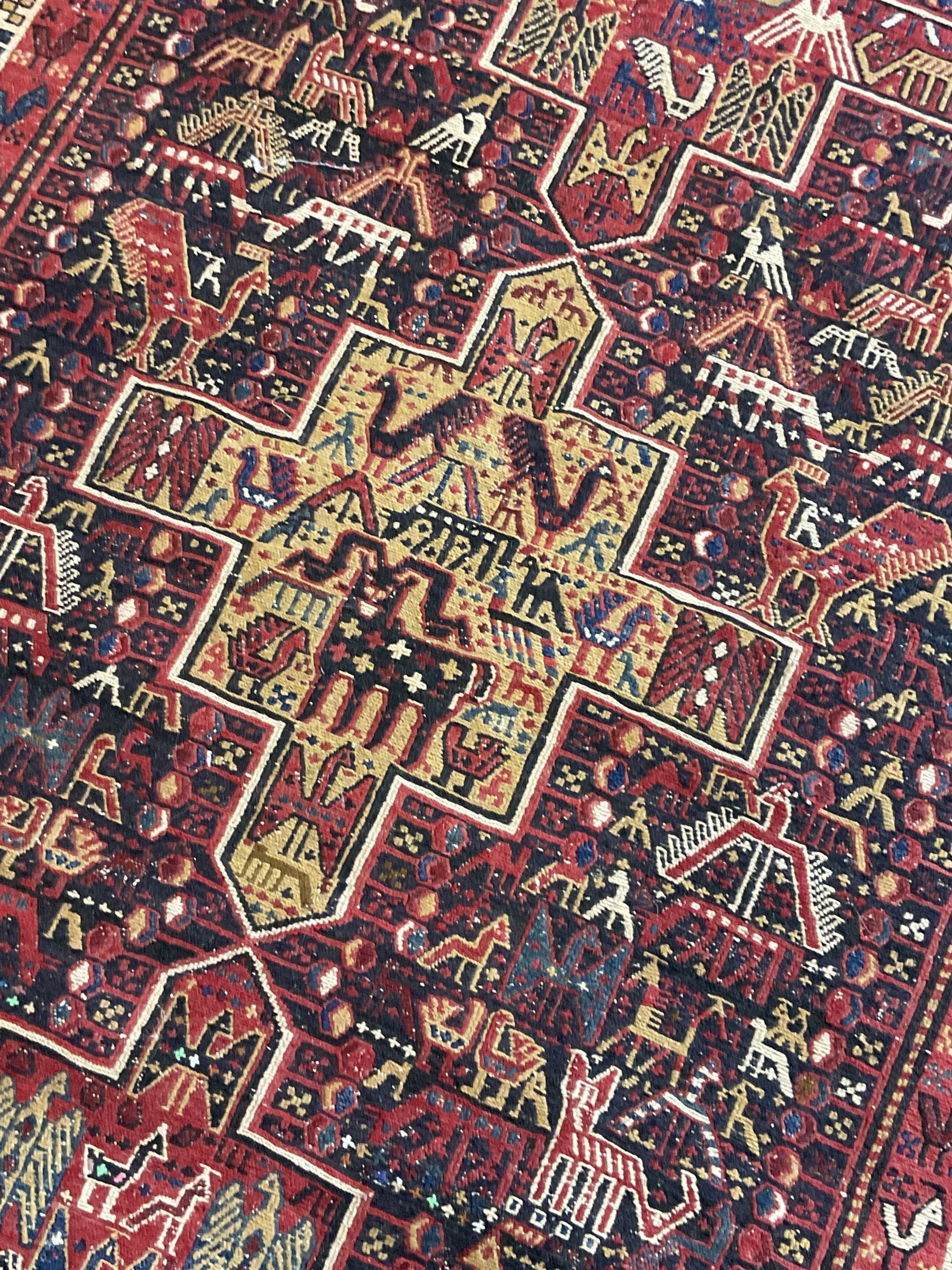North African flat-woven rug, decorated with small stylised animal and bird motifs, five geometric star medallions