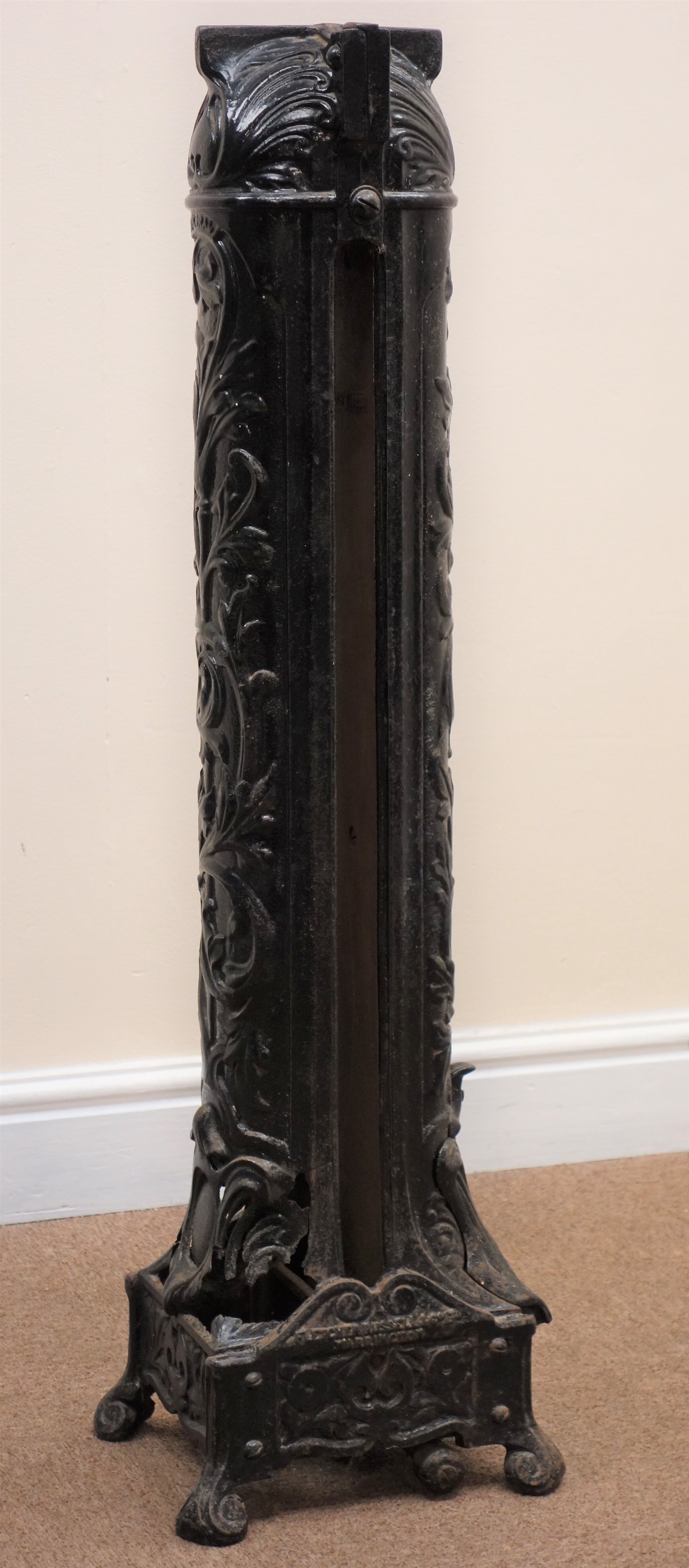 Victorian ornate cast iron gas room heater on four scrolled feet, W23cm