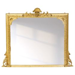 Victorian giltwood and gesso framed overmantel mirror, the scallop shell pediment with tra...