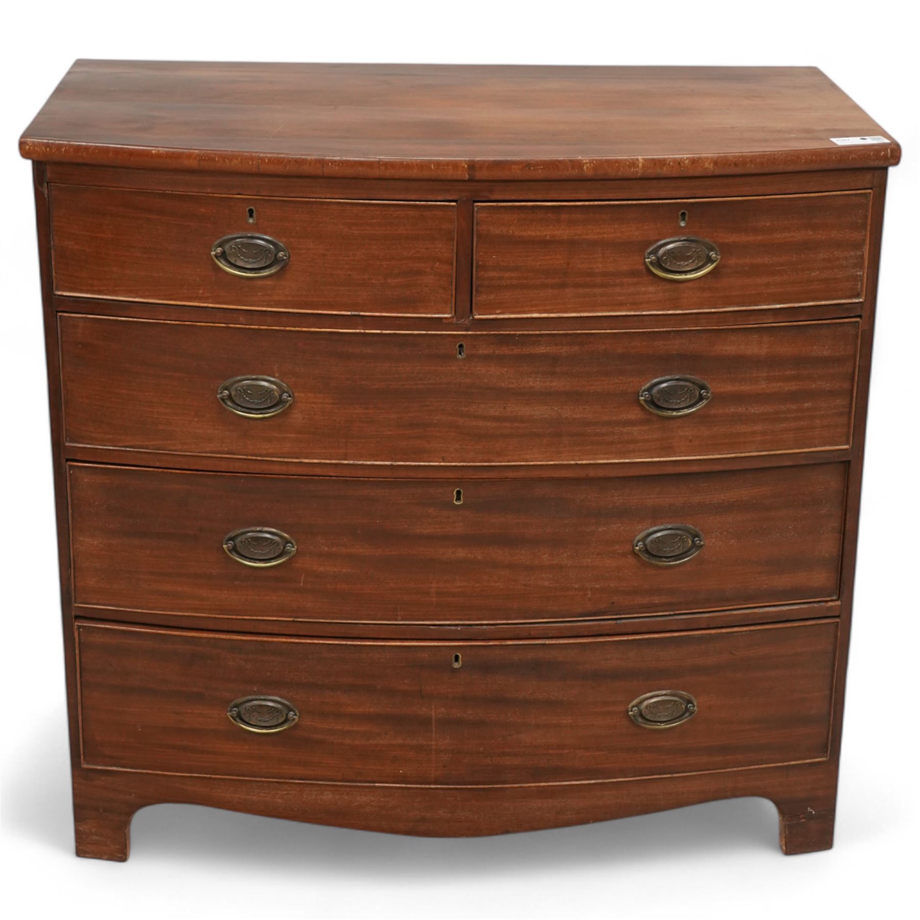 Early 19th century mahogany bow-front chest, two short over three long cock-beaded drawers, on bracket feet