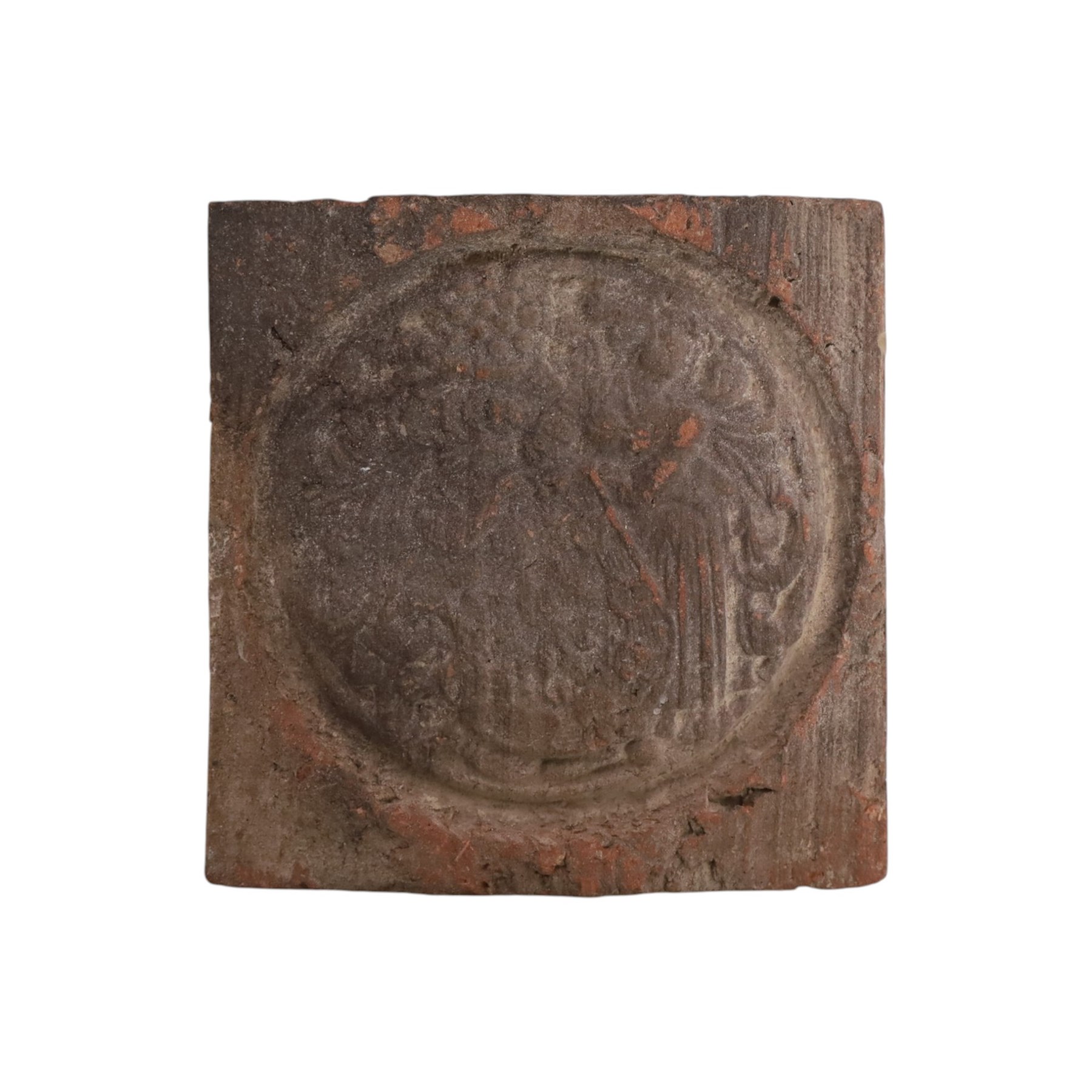 Three medieval tiles, decorated in relief, H10cm