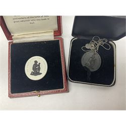 Group of William Wilberforce Abolition of Slavery items, comprising Wedgwood black on cane Jasperware pin tray, Wedgwood light blue Jasperware plate, and two Wedgwood oval medallion pendants, each depicting a kneeling figure beneath the inscription 'AM I NOT A MAN AND A BROTHER?', an Eastgate pottery plaque decorated in relief with a kneeling figure before William Wilberforce, a Hull Museum Publications pamphlet titled 'Medals, Tokens, etc., Issued in Connection with William Wilberforce and the Abolition of Slavery', by Thomas Sheppard, dated 1916, and an antique print depicting William Wilberforce after the original portrait by George Richmond, (7)