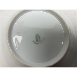 WW2 Nymphenburg cups and saucer, decorated with Imperial German Iron Cross encircled in a foliate boarder with gilt edging, with printed mark beneath 