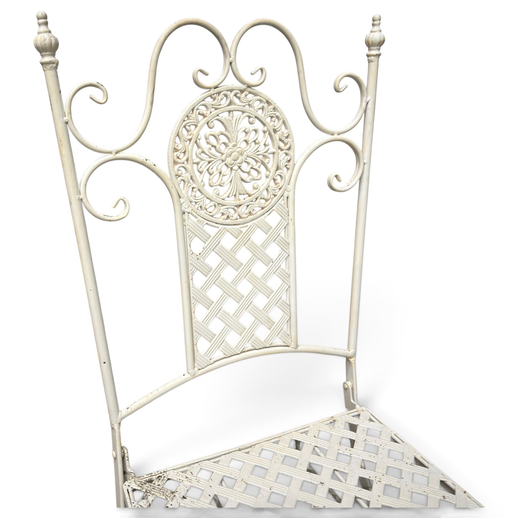 Pair of Victorian design wrought metal folding garden chairs, scrolled cresting rail over pierced foliate medallion, lattice back and seat on X-frame folding base