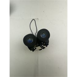 Four pairs of binoculars, to include Carl Zeiss Jena Jenoptem 8x30W serial no. 3750814, Nikon Sporting II 8x40 serial no. 604672, Minolta Pocket II 8x22 Field 7 and Jessops 12x25 Field 4.8 84m/1000m, all in carrying cases 