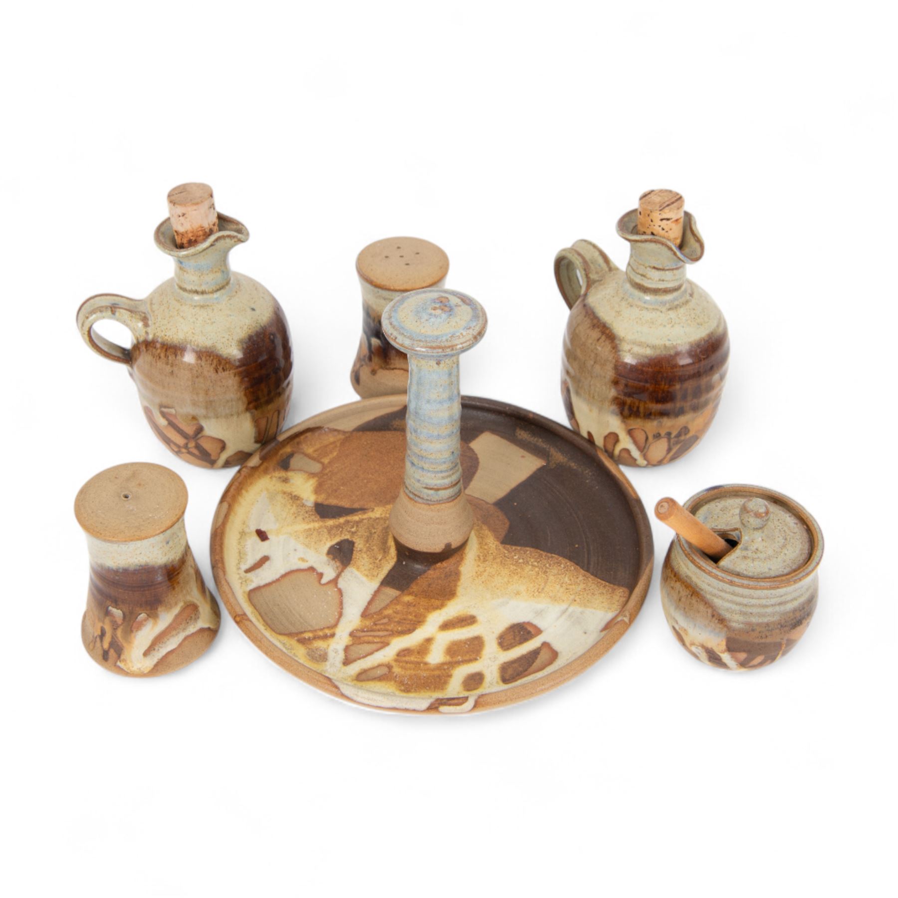Canterbury Pottery studio pottery cruet set, comprising salt and pepper shaker, mustard pot, oil jug, vinegar jug and stand 