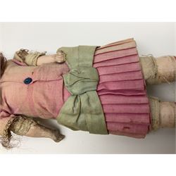 Victorian wax shoulder head doll with applied hair, inset glass eyes and jointed body with composition lower limbs; faded pink dress H35cm