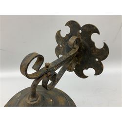 Wrought iron wall lantern with patterned glass shade of tapering cylindrical form, H29cm