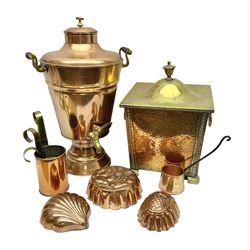  Arts and Crafts style copper and brass coal bucket, with two loop handles and four bracket feet, together with a copper and brass samovar, three copper moulds and four copper measuring cups, samovar H54cm